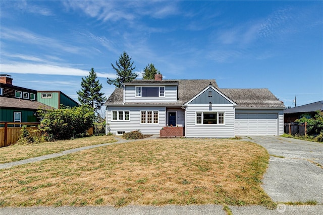1415 E 2nd St, Port Angeles, WA 98362 - traditional home featuring a chimney, driveway, an attached garage, and board and batten siding