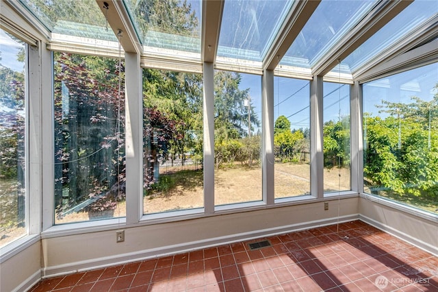 1415 E 2nd St, Port Angeles, WA 98362 - unfurnished sunroom with tile patterned floors and baseboards