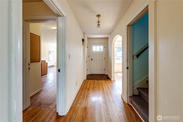 1415 E 2nd St, Port Angeles, WA 98362 - entryway with wood finished floors, arched walkways, and stairway