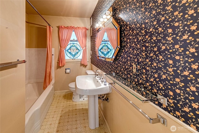 1415 E 2nd St, Port Angeles, WA 98362 - full bathroom with shower / bathtub combination with curtain and wallpapered walls