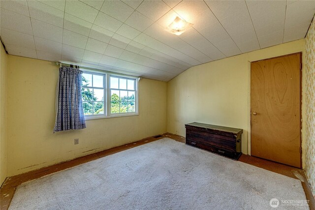 1415 E 2nd St, Port Angeles, WA 98362 - spare room with lofted ceiling and carpet floors
