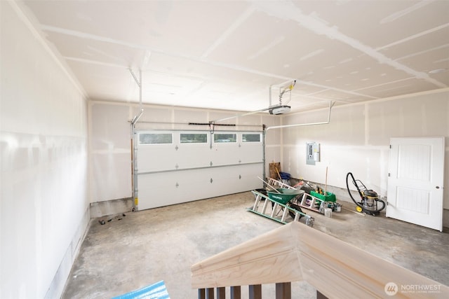 24 Hurd Rd, Elma, WA 98541 - garage with electric panel and a garage door opener