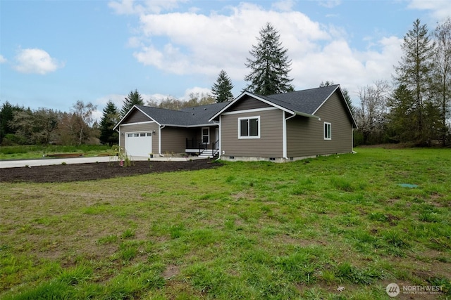 24 Hurd Rd, Elma, WA 98541 - view of front of property featuring a garage and a front yard