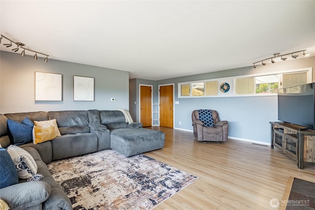 2483 Hilltop Rd, Ferndale, WA 98248 - living room with track lighting and wood finished floors