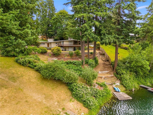 2219 Yelm Hwy SE, Olympia, WA 98501 - view of grassy yard featuring a dock and a deck with water view