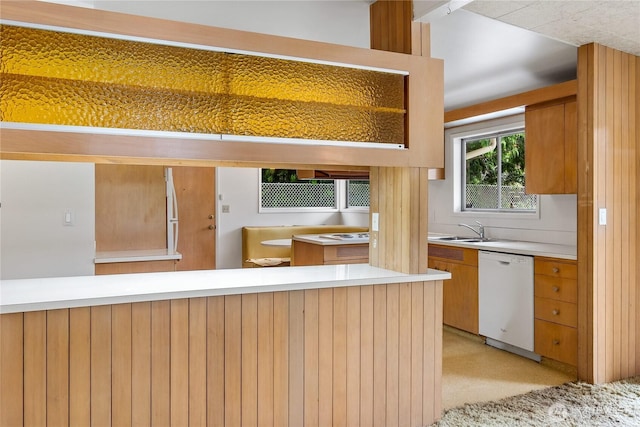 2219 Yelm Hwy SE, Olympia, WA 98501 - kitchen with dishwasher, light countertops, and brown cabinetry