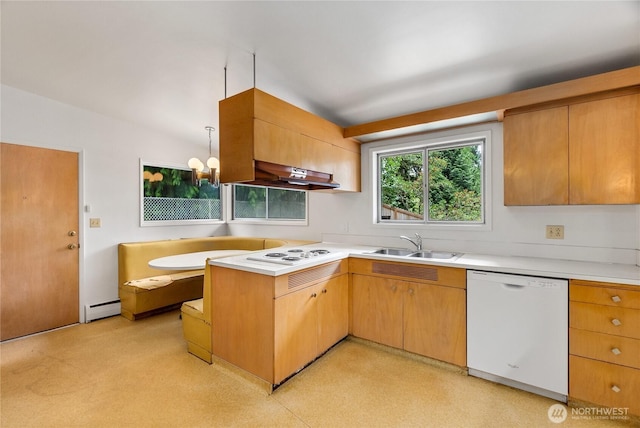 2219 Yelm Hwy SE, Olympia, WA 98501 - kitchen with white appliances, under cabinet range hood, a peninsula, and light countertops