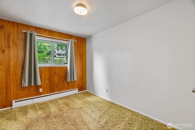 2219 Yelm Hwy SE, Olympia, WA 98501 - carpeted spare room featuring baseboard heating and wooden walls