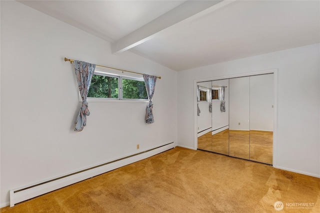 2219 Yelm Hwy SE, Olympia, WA 98501 - unfurnished bedroom featuring a baseboard heating unit, carpet flooring, and a closet