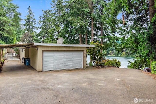 2219 Yelm Hwy SE, Olympia, WA 98501 - garage featuring a garage and a water view