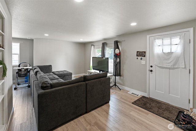 135 F St SE, Ephrata, WA 98823 - living room with light wood-style flooring and recessed lighting