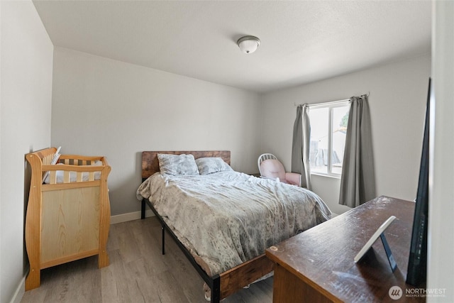 135 F St SE, Ephrata, WA 98823 - bedroom with wood finished floors and baseboards