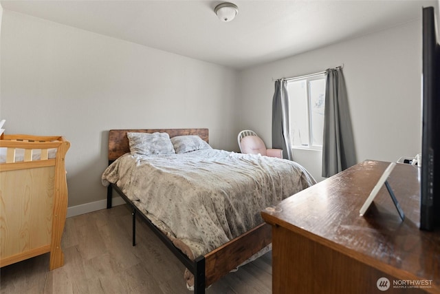 135 F St SE, Ephrata, WA 98823 - bedroom featuring wood finished floors