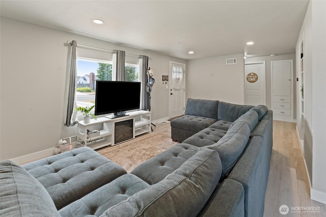 135 F St SE, Ephrata, WA 98823 - living room with recessed lighting and wood finished floors