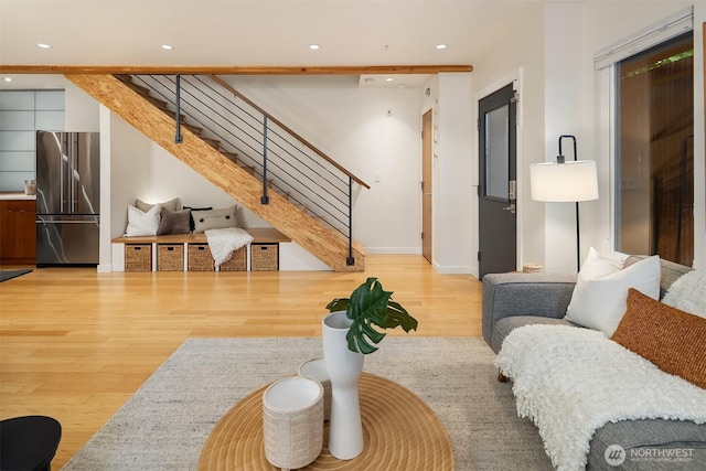 3659 Whitman Ave N, Seattle, WA 98103 - living area with stairs, wood finished floors, and recessed lighting