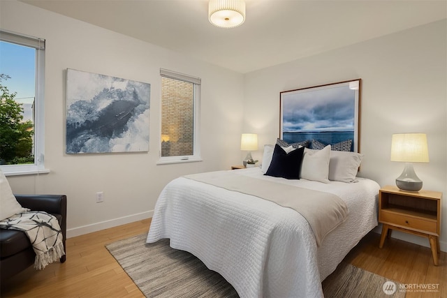 3659 Whitman Ave N, Seattle, WA 98103 - bedroom featuring wood finished floors and baseboards