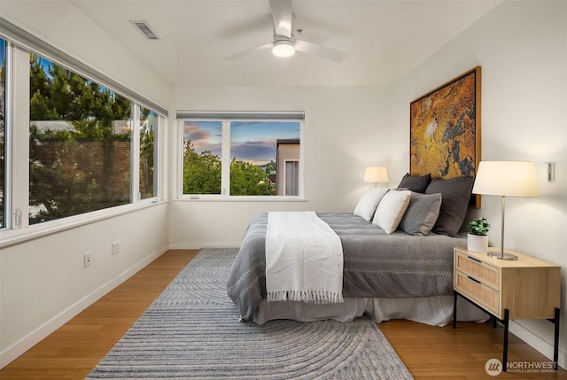 3659 Whitman Ave N, Seattle, WA 98103 - bedroom featuring wood finished floors and ceiling fan