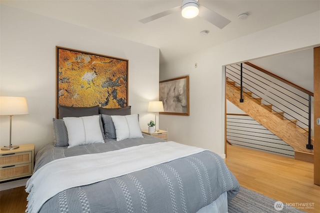 3659 Whitman Ave N, Seattle, WA 98103 - bedroom with wood finished floors and a ceiling fan