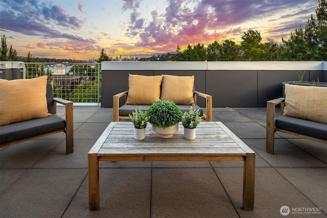 3659 Whitman Ave N, Seattle, WA 98103 - patio terrace at dusk with an outdoor hangout area and a patio