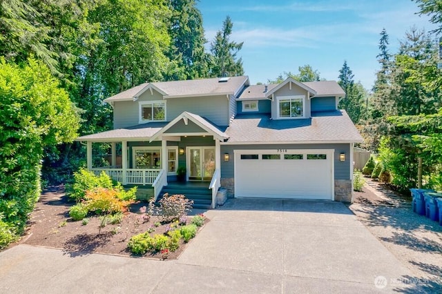7516 181st Pl SW, Edmonds, WA 98026 - view of front of house with a porch, concrete driveway, a garage, stone siding, and a shingled roof