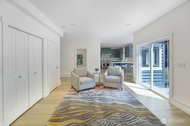 7516 181st Pl SW, Edmonds, WA 98026 - living area featuring light wood-style flooring, plenty of natural light, and recessed lighting