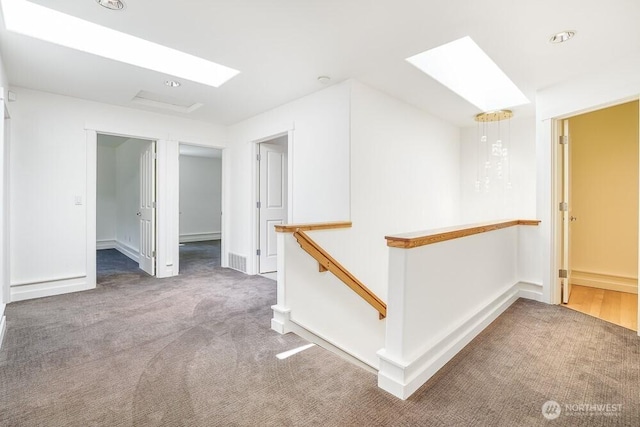 7516 181st Pl SW, Edmonds, WA 98026 - corridor with a skylight, an upstairs landing, and carpet flooring