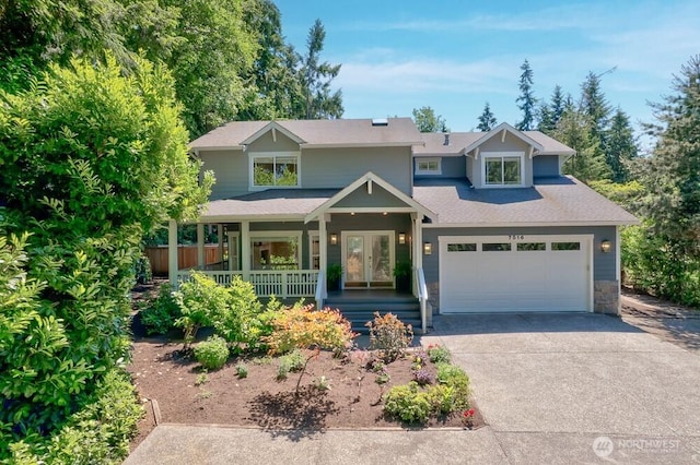 7516 181st Pl SW, Edmonds, WA 98026 - view of front facade with a porch, driveway, and stone siding
