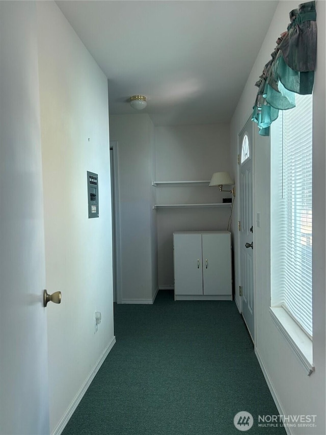 72 Misty Glen Ln, Sequim, WA 98382 - kitchen with dark colored carpet and baseboards