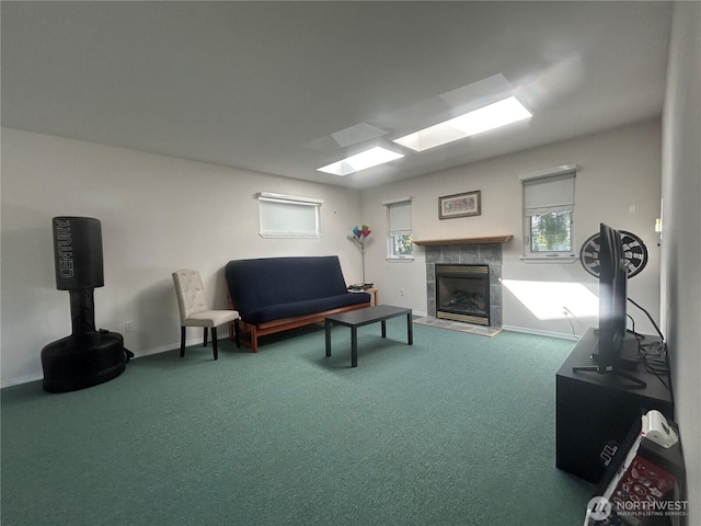 72 Misty Glen Ln, Sequim, WA 98382 - living area with a tiled fireplace and carpet flooring