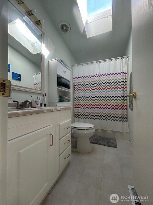 72 Misty Glen Ln, Sequim, WA 98382 - full bath featuring tile patterned flooring, vanity, vaulted ceiling, and a shower with shower curtain