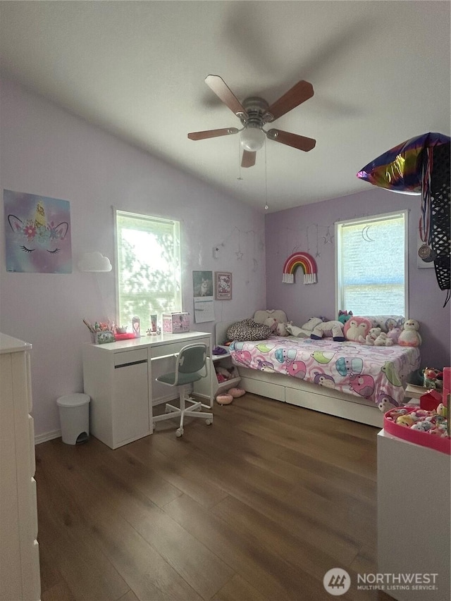 72 Misty Glen Ln, Sequim, WA 98382 - bedroom featuring multiple windows, wood finished floors, and a ceiling fan