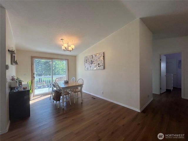 72 Misty Glen Ln, Sequim, WA 98382 - dining room featuring wood finished floors, a chandelier, and vaulted ceiling