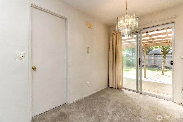 26622 190th Ave SE, Covington, WA 98042 - unfurnished dining area featuring carpet and a chandelier