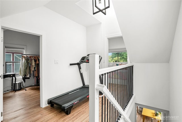 8739 17th Ave NW, Seattle, WA 98117 - workout area with vaulted ceiling and wood finished floors