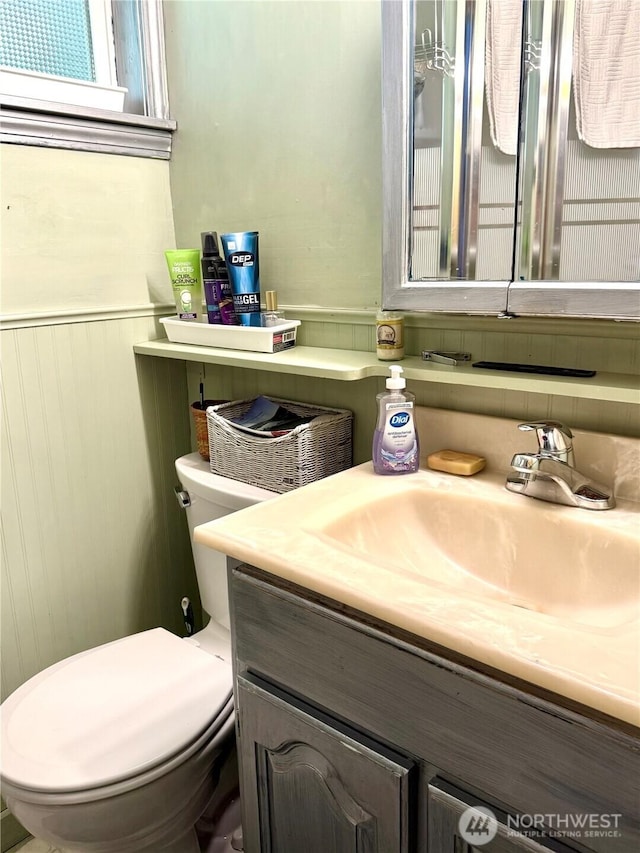 27805 L Pl, Ocean Park, WA 98640 - half bathroom with vanity and wainscoting