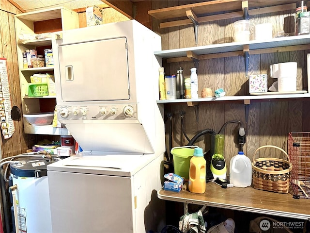 27805 L Pl, Ocean Park, WA 98640 - washroom featuring stacked washer / drying machine and wood walls