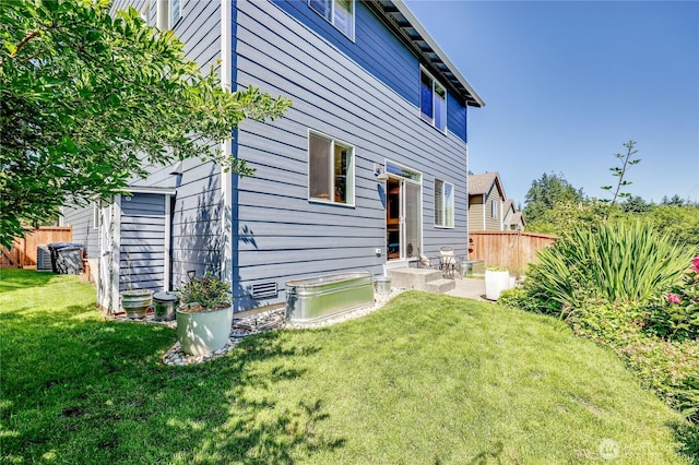 21598 NW Monterey Loop, Poulsbo, WA 98370 - rear view of house featuring a patio