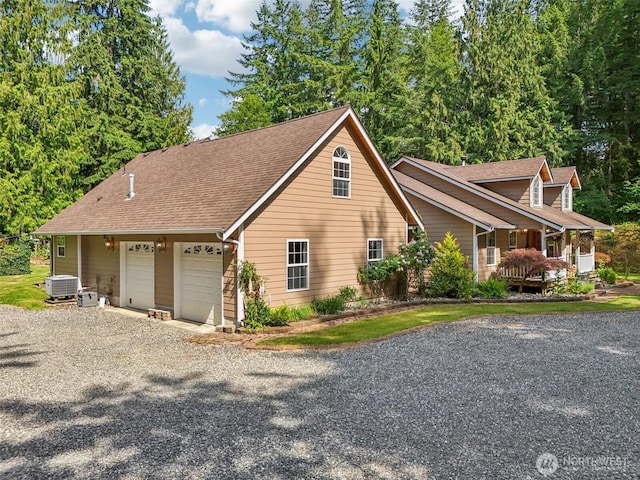 6611 Menzel Lake Rd, Granite Falls, WA 98252 - view of front facade with driveway and a shingled roof
