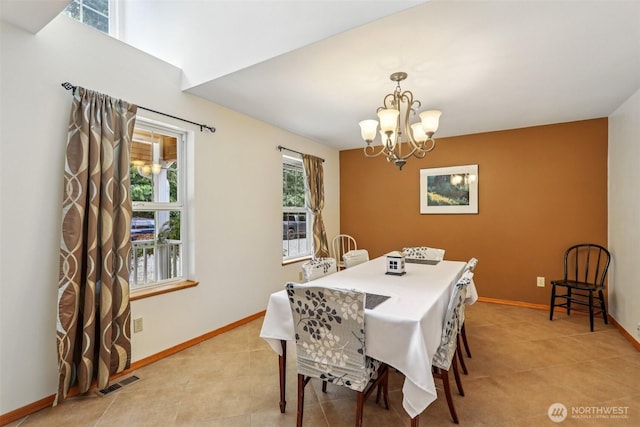6611 Menzel Lake Rd, Granite Falls, WA 98252 - dining space with a chandelier and light tile patterned floors