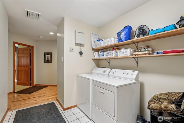 6611 Menzel Lake Rd, Granite Falls, WA 98252 - laundry room featuring washing machine and clothes dryer, recessed lighting, and light tile patterned flooring
