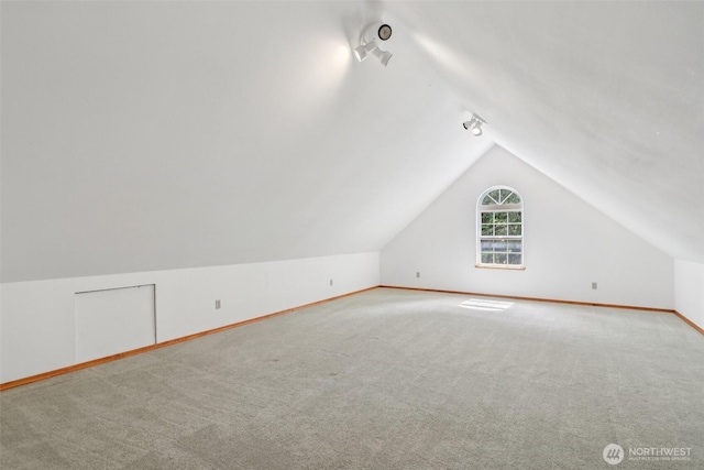 6611 Menzel Lake Rd, Granite Falls, WA 98252 - additional living space featuring vaulted ceiling and carpet flooring