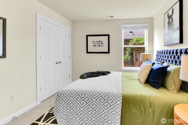 4241 S Eddy St, Seattle, WA 98118 - carpeted bedroom with baseboards and a closet