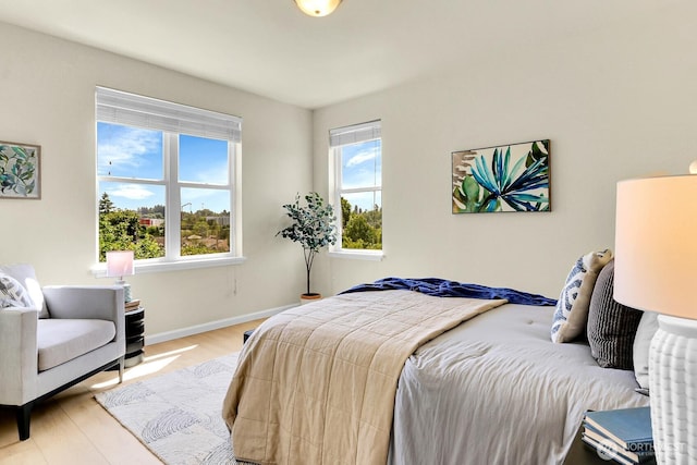 4241 S Eddy St, Seattle, WA 98118 - bedroom featuring wood finished floors and baseboards