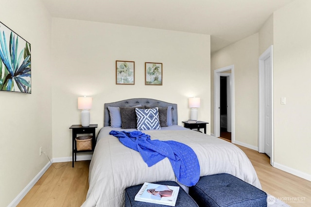 4241 S Eddy St, Seattle, WA 98118 - bedroom featuring light wood-style flooring and baseboards