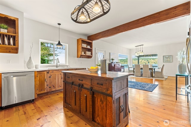 12979 Lala Cove Ln SE, Olalla, WA 98359 - kitchen featuring stainless steel dishwasher, healthy amount of natural light, open shelves, light wood finished floors, and beamed ceiling