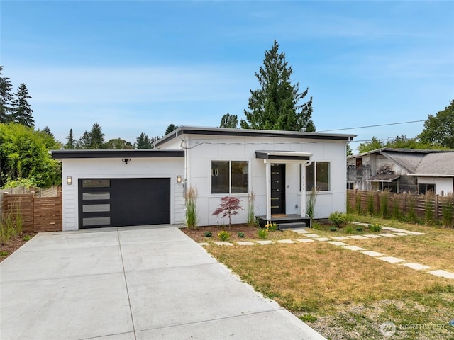3124 Oas Dr W, University Place, WA 98466 - contemporary house with an attached garage and driveway