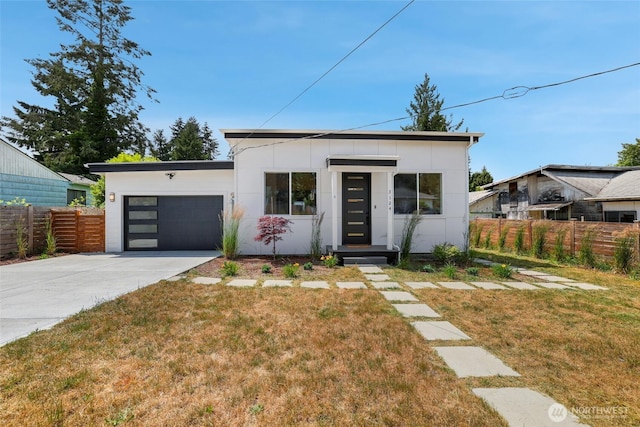 3124 Oas Dr W, University Place, WA 98466 - contemporary house featuring a garage and concrete driveway