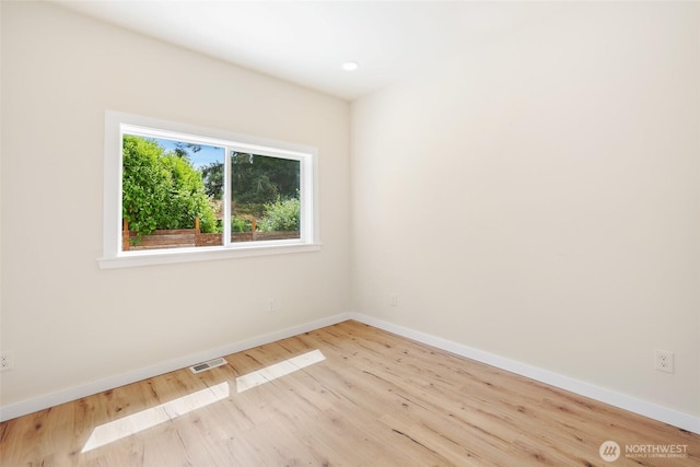 3124 Oas Dr W, University Place, WA 98466 - unfurnished room featuring wood finished floors and baseboards