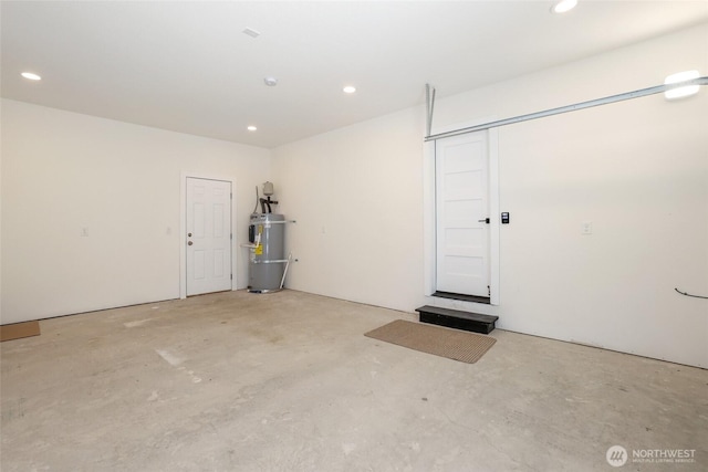 3124 Oas Dr W, University Place, WA 98466 - garage featuring water heater and recessed lighting