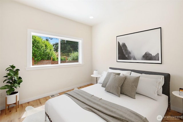 3124 Oas Dr W, University Place, WA 98466 - bedroom featuring wood finished floors and baseboards